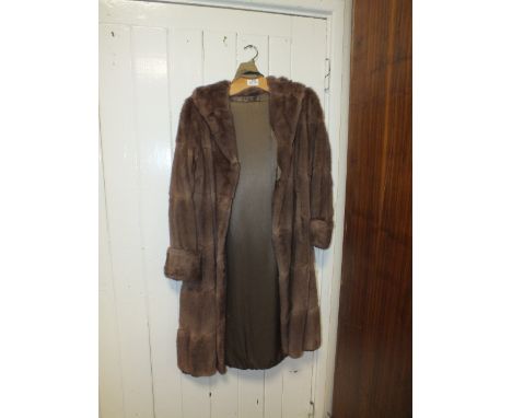 A VINTAGE LADIES FUR COAT 