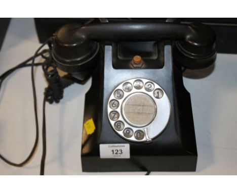 A VINTAGE BAKELITE TELEPHONE WITH MODERN CONNECTION