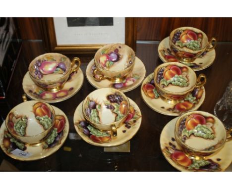 SEVEN AYNSLEY ORCHARD GOLD PATTERN CUPS AND SAUCERS