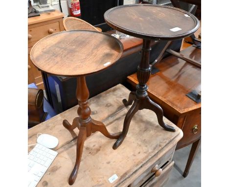 Two circular mahogany tripod wine tables (2)