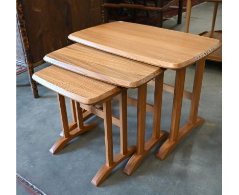 A nest of three Ercol light elm side tables with octagonal supports - largest 62 cm w x 40 cm d x 43 cm h