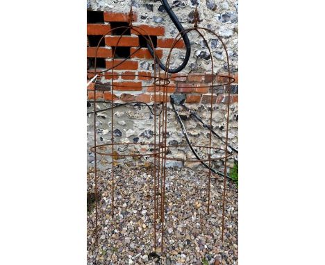 Pair of weathered steel arrow head obelisks (2)