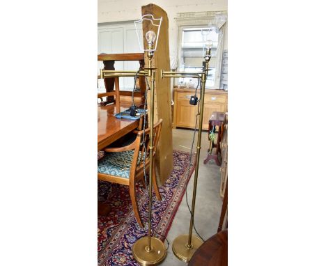 A pair of 'Pooky Lighting Company' swing standard lamps, 148 cm high overall (2)