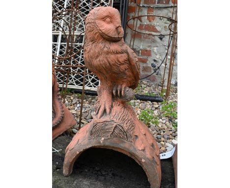 A cast terracotta owl ridge tile