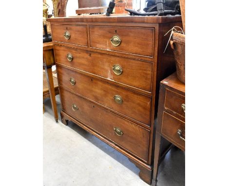 A 19th century mahogany chest of two short over three long drawers with brass handles, raised on bracket feet, 110 cm w x 53 