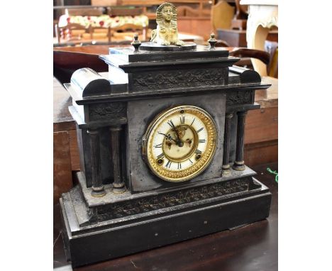 An Ansonia Clock Company, New York architectural slate mantel clock surmounted by brass sphynx, with twin train movement stri