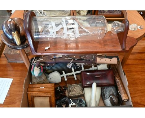 Glass ship in a bottle on a wooden stand, to/w carved wood birds and other ornaments; lot also includes a walnut cased mantel