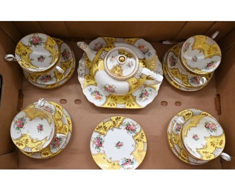 A Fenton china part tea service for eight, including teapot, printed and painted with flowers on a yellow and gilt ground - t