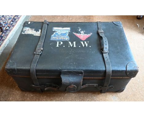 A black luggage trunk initialled PMW, by repute the once property of Major APW Wardlaw of the Royal Sussex Regiment in the 19