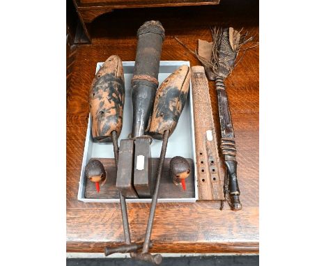 Maritime interest: a carved wood belaying-pin (cosh), the canvas sleeve with ropework binding, 31 cm, to/w a pair of screw-ac
