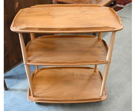 An Ercol (model 458) Golden Dawn light elm and beech three-tier tea trolley on ball castors circa 1970s, 72 cm w x 46 cm d x 