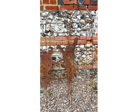 A pair of weathered steel arrow head obelisks (2)