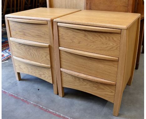 A pair of modern light oak three drawer bedside chests to match lot 412, 46 cm w x 44 cm d x 60 cm h