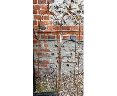 Pair of weathered steel arrow head obelisks (2)