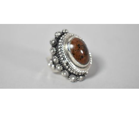 A Mexican Silver Secret Ring with Hinged Jewel to Oval Compartment, Stamped Sterling 