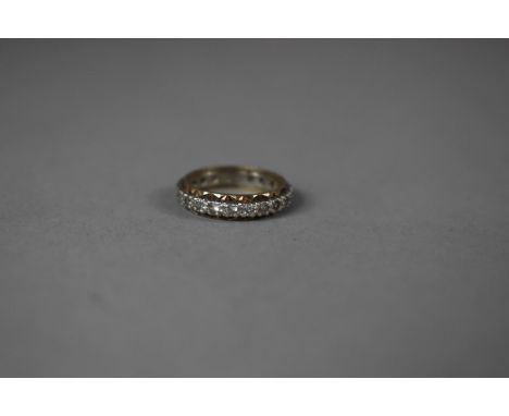 A Gold and White Metal Full Band Eternity Ring, 2.9g 