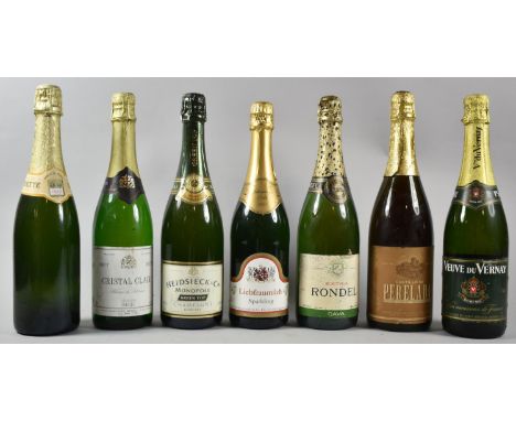 A Collection of Seven Bottles of Sparkling Wine to Include Heidsieck Green Top Champagne 