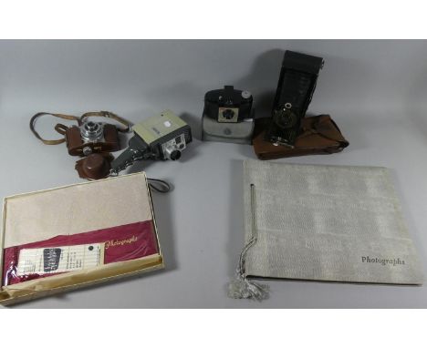 Three Vintage Cameras, Two Photographs Albums and an 8mm Cine Camera 