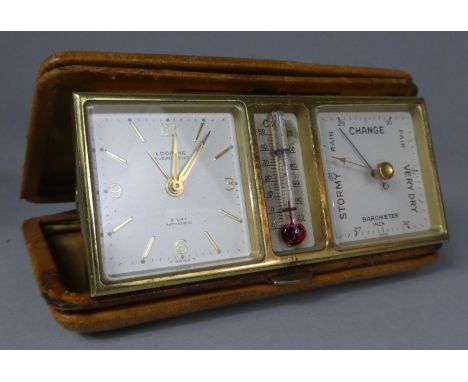 A Mid 20th Century Leather Cased Travel Clock with Thermometer and Barometer, 12cm wide 