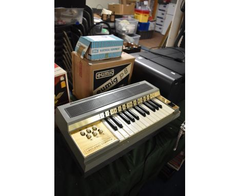 A Rosedale Electric Chord Organ, Together with a Eumig 8mm Cine Projector and a 12 Volt Train Controller 