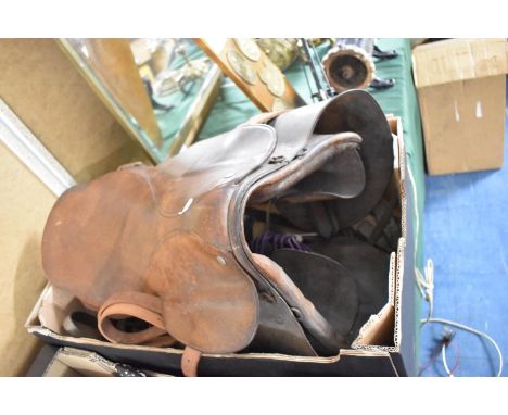 A Vintage Leather Saddle and Other Horse Tack 