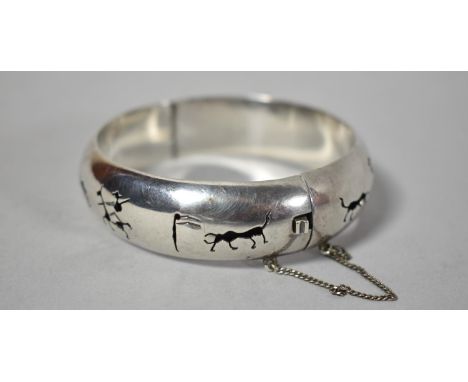A Mexican Silver Bangle, Stamped 925 Decorated with Matadors and Picadors 