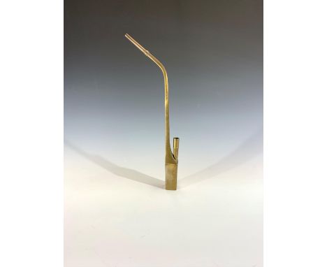 A Japanese brass opium pipe, character marks to base, height 38cm.