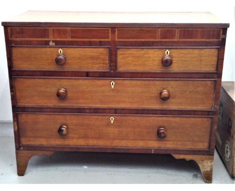 A George III oak and mahogany chest of drawers, with two short and two long drawers, on splay bracket feet, height 88cm, widt