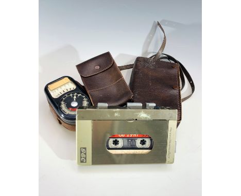 A G.E.C.Stereo Starwalker cassette player, model R8701H, cased and a light meter.