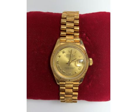 A Rolex Ladies 18ct gold Oyster Perpetual Superlative Chronometer Datejust wristwatch model 69278 with boxes and booklets, ta