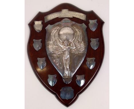 A large mid 20th century mahogany shield shape motorcycling trophy, 'The Eleanor Middleton Trophy 1948 ', with silver plate t