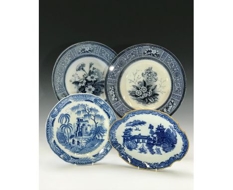Two Victorian South Wales pottery pearlware soup plates, transfer printed with floral patterns, one marked Coombes &amp; Holl