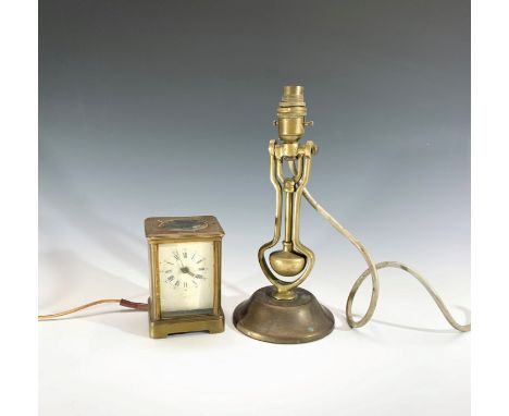 A ship's brass gimbal lamp, fitted for electricity and with slot for wall mounting, overall height 30cm, together with a bras