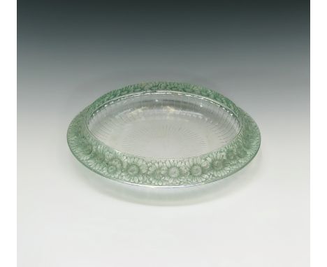 A Lalique 'Marguerites' pattern shallow circular bowl, the border with flower head decoration, etched 'R Lalique France' to b