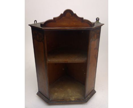 A late 19th/early 20th century mahogany penwork hanging corner cupboard, decorated with Art Nouveau motifs, Height 54cm, widt