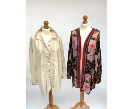 A cream silk Nicole Farrhi embroidered blouse, label size 12 -14, together with a floaty floral top in blacks and pinks, labe