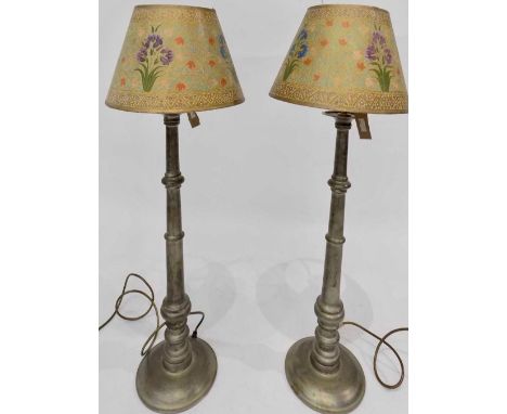 A pair of silver coloured metal table lamps, with Persian design lampshades decorated with irises. Overall height 82cm.