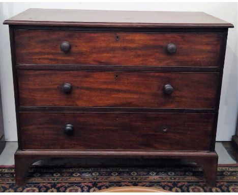 A George III mahogany chest of drawers, with three long drawers, on bracket feet. height 91cm, width 110cm, depth 55cm.