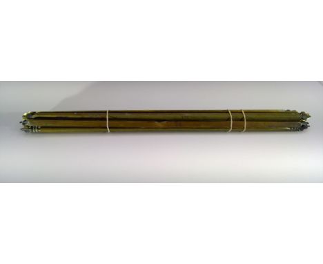 A set of 14 brass stair rods. Width 68cm.Condition report: The bracket fittings are lacking.