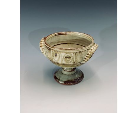 A Michael Cardew Wenford Bridge studio pottery twin handled vessel, impressed marks to base. Height 12cm.Condition report: In