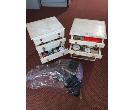 Watches, watchmakers tools, etc. mostly in a pair of miniature chests