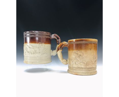A large 19th century saltglazed stoneware mug, decorated in relief with a hunting scene, the handle modelled as a greyhound, 