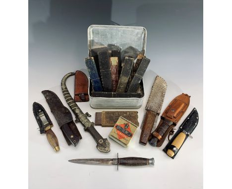 A Japanese explorer custom hunting knife, in leather sheath, 22cm, assorted other knives and a quantity of cut throat razors,