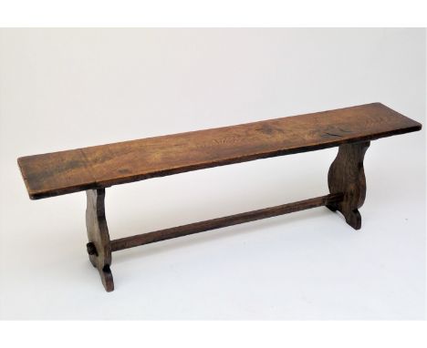 An elm bench, 20th century, height 46cm, width 156cm, depth 28cm.