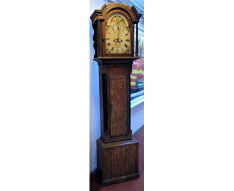 A George III eight day oak longcase clock, the rolling moon arched dial signed 'Wm Menadue, Camborne', height 204cm.Condition