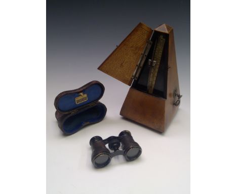 A pair of opera glasses, the inner lid of case bearing printed label 'Whitings...6 Market Street...Manchester', together with