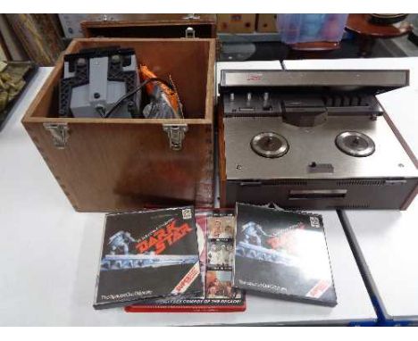 A Philips reel to reel recorder, box of Prinz Oxford Super 8 movie editor and films 