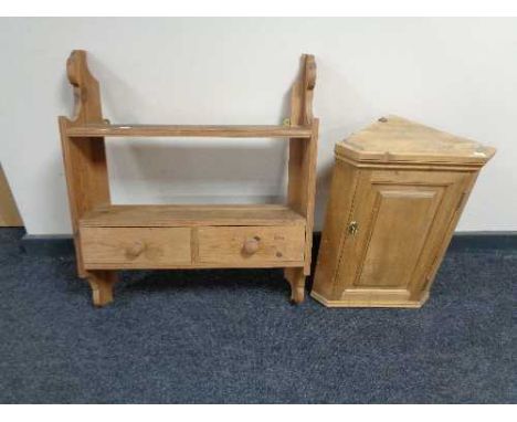 A pine wall shelf fitted with two drawers together with a small pine cabinet 