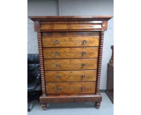 A Victorian mahogany six drawer Scotch chest with pillar column supports. Height 186 cm x width 138 cm x depth 65 cm.