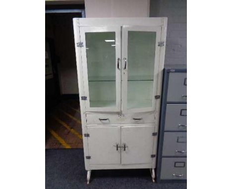 A mid century painted metal medical cabinet 85 cm x 176 cm x depth 40 cm. CONDITION REPORT: This has general scuffs and marks